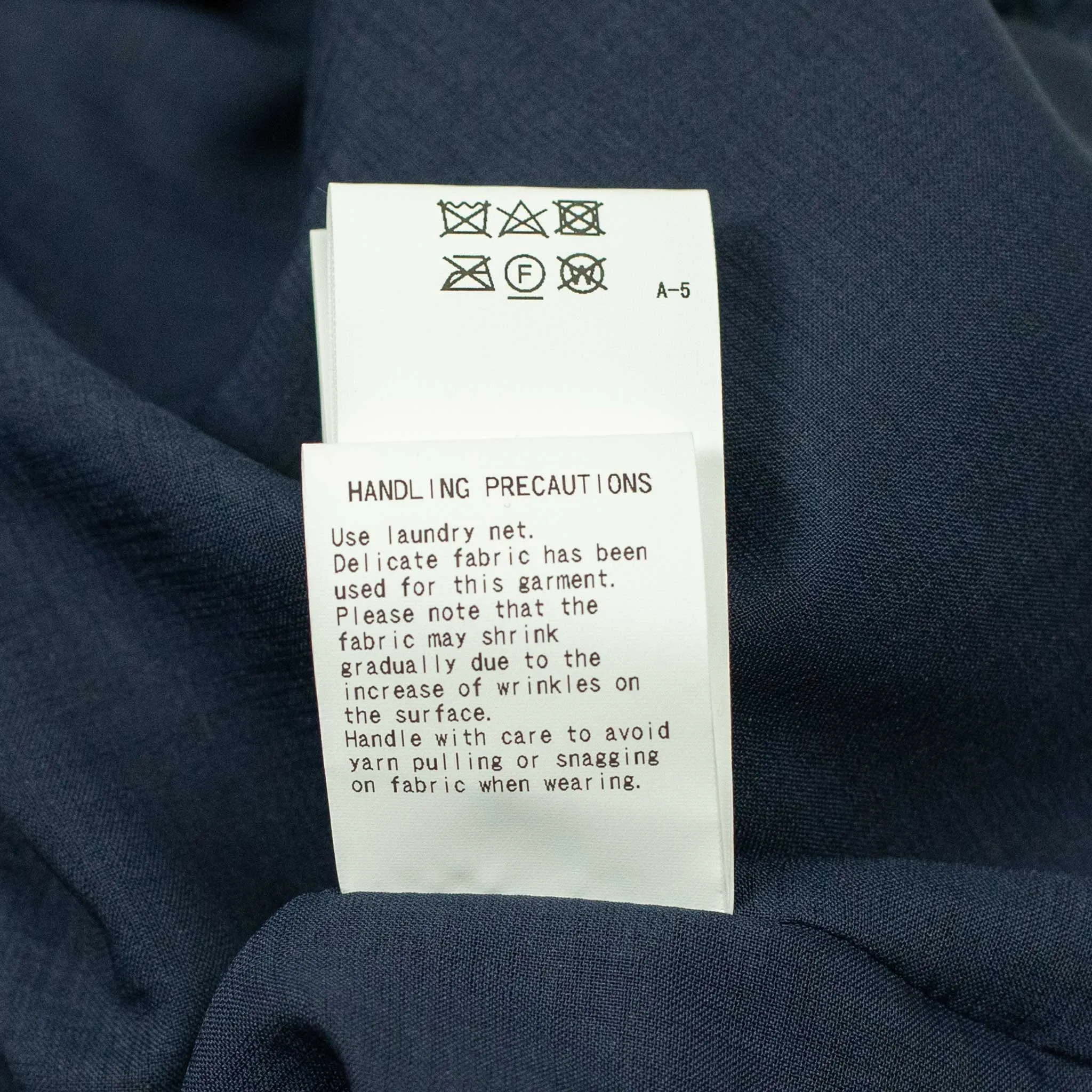 Drawstring trousers in shirred indigo-dyed cupro
