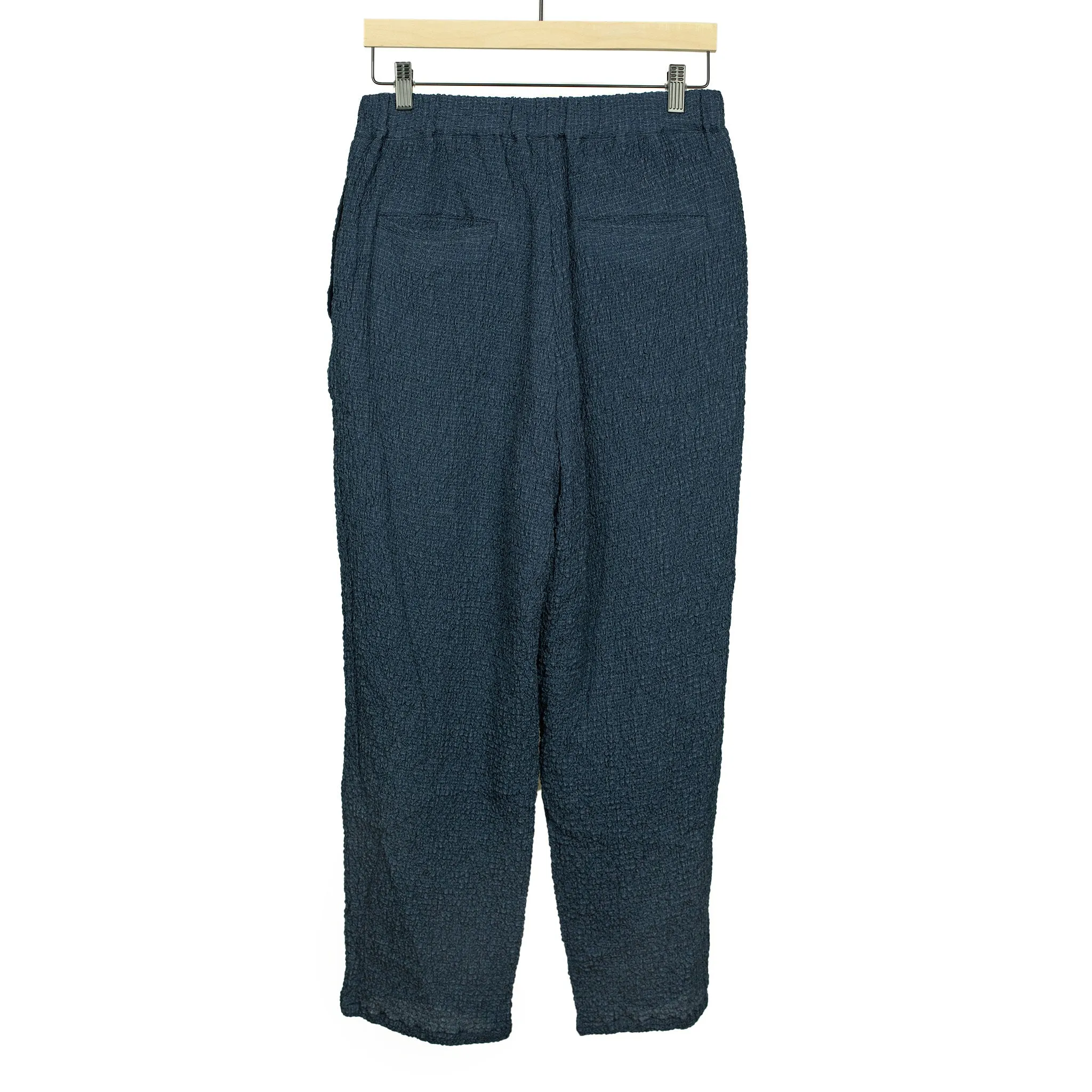 Drawstring trousers in shirred indigo-dyed cupro