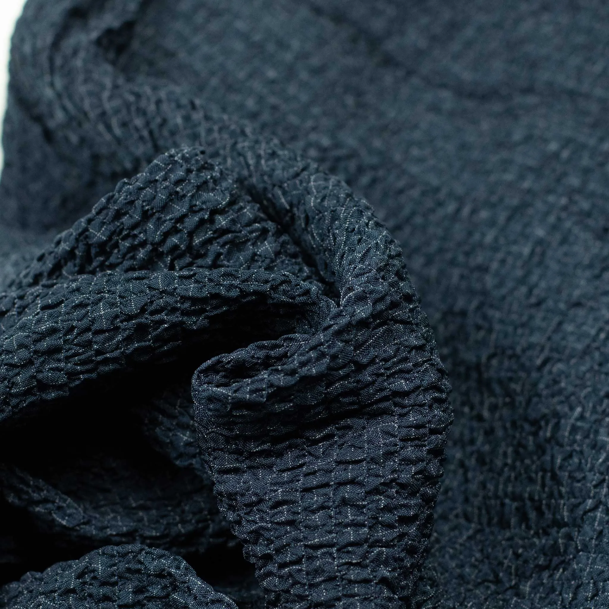 Drawstring trousers in shirred indigo-dyed cupro